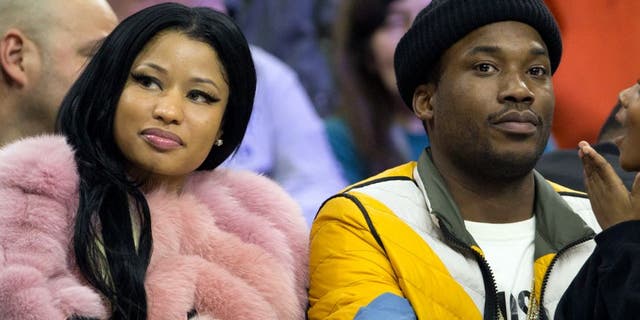PHILADELPHIA, PA - JANUARY 26: Recording artists Nicki Minaj and Meek Mill look on during the game between the Phoenix Suns and Philadelphia 76ers on January 26, 2016 at the Wells Fargo Center in Philadelphia, Pennsylvania. (Mitchell Leff/Getty Images)