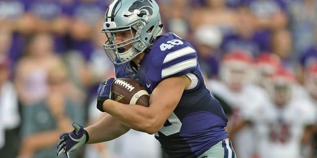 MANHATTAN, KS - SEPTEMBER 05: Full back Glenn Gronkowski #48 of the Kansas State Wildcats runs up field against the South Dakota Coyotes during the first half on September 5, 2015 at Bill Snyder Family Stadium in Manhattan, Kansas. (Photo by Peter G. Aiken/Getty Images)