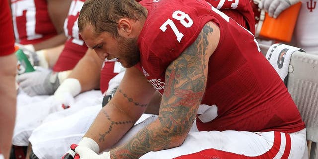 Aug 30, 2014; Bloomington, IN, USA; Indiana Hoosiers offensive tackle Jason Spriggs (78) on the bench during the third quarter against the Indiana State Sycamores at Memorial Stadium. Indiana won 28-10. Mandatory Credit: Pat Lovell-USA TODAY Sports