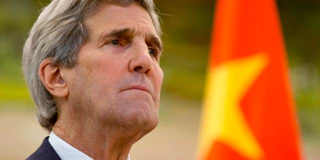 Jan. 27, 2016: U.S. Secretary of State John Kerry listens to an opening statement by Chinese Foreign Minister Wang Yi during a news conference at the Ministry of Foreign Affairs in Beijing on the final leg in Kerry's latest round-the-world diplomatic mission.