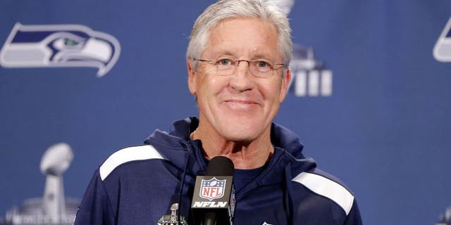 Jan 27, 2014; Jersey City, NJ, USA; Seattle Seahawks head coach Pete Carroll addresses the media during a press conference for Super Bowl XLVIII at The Westin. Mandatory Credit: Jim O'Connor-USA TODAY Sports