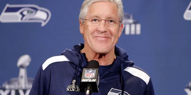 Jan 27, 2014; Jersey City, NJ, USA; Seattle Seahawks head coach Pete Carroll addresses the media during a press conference for Super Bowl XLVIII at The Westin. Mandatory Credit: Jim O'Connor-USA TODAY Sports