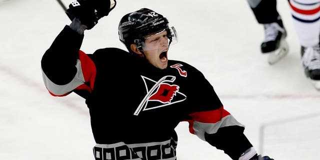 RALEIGH, NC - JANUARY 27: Eric Staal #12 of the Carolina Hurricanes celebrates his game-tying goal against the Columbus Blue Jackets at PNC Arena on January 27, 2014 in Raleigh, North Carolina. (Photo by Kevin C. Cox/Getty Images)