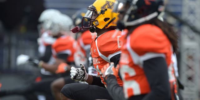 Jan 27, 2016; Mobile, AL, USA; North squad players, including dc Eric Murray of Minnesota (middle) stretch during Senior Bowl practice at Ladd-Peebles Stadium. Mandatory Credit: Glenn Andrews-USA TODAY Sports