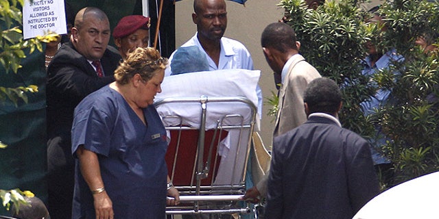 Jan. 28: Former South African President Nelson Mandela, is taken on a stretcher from the Milpark Hospital in Johannesburg.