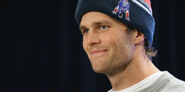 FOXBORO, MA - JANUARY 22: New England Patriots quarterback Tom Brady talks to the media during a press conference to address the under inflation of footballs used in the AFC championship game at Gillette Stadium on January 22, 2015 in Foxboro, Massachusetts. (Photo by Maddie Meyer/Getty Images)