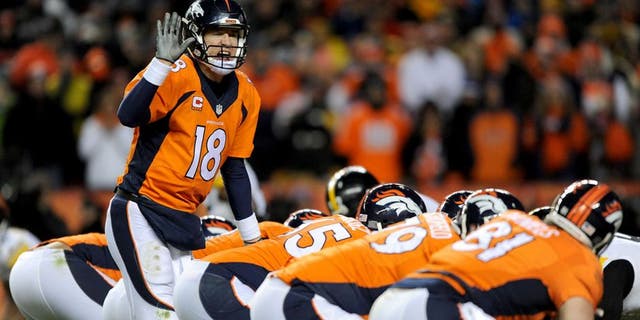 DENVER, CO - JANUARY 17: Peyton Manning #18 of the Denver Broncos calls a play against the Pittsburgh Steelers during the AFC Divisional Playoff Game at Sports Authority Field at Mile High on January 17, 2016 in Denver, Colorado. (Photo by Dustin Bradford/Getty Images)