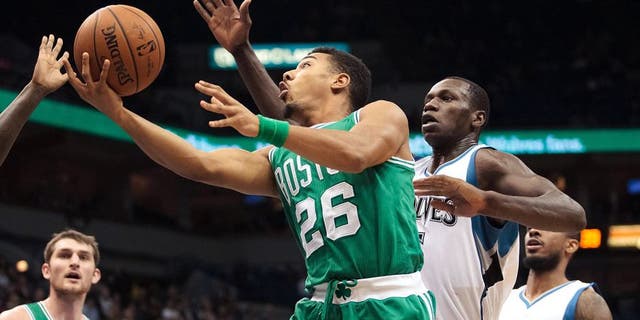 Jan 28, 2015; Minneapolis, MN, USA; Boston Celtics guard Phil Pressey (26) shoots in the third quarter against the Minnesota Timberwolves at Target Center. The Minnesota Timberwolves beat the Boston Celtics 110-98. Mandatory Credit: Brad Rempel-USA TODAY Sports