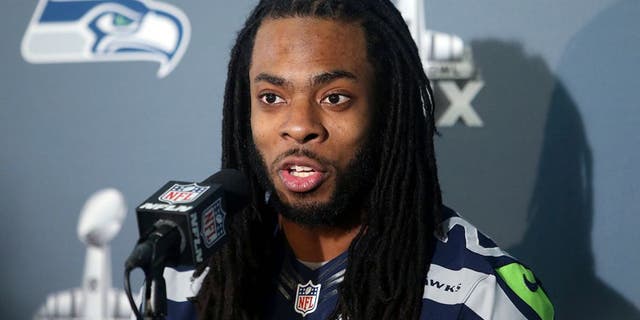 Jan 28, 2015; Phoenix, AZ, USA; Seattle Seahawks cornerback Richard Sherman talks to reporters during the Seattle Seahawks press conference at Arizona Grand. Mandatory Credit: Peter Casey-USA TODAY Sports