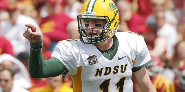 AMES, IA - AUGUST 30: Quarterback Carson Wentz #11 of the North Dakota State Bison calls a play in the second half of play against the Iowa State Cyclones at Jack Trice Stadium on August 30, 2014 in Ames, Iowa. North Dakota State defeated Iowa State 34-14. (Photo by David K Purdy/Getty Images)
