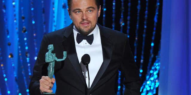 Leonardo DiCaprio accepts the award for outstanding male actor in a leading role for “The Revenant” at the 22nd annual Screen Actors Guild Awards at the Shrine Auditorium & Expo Hall on Saturday, Jan. 30, 2016, in Los Angeles.