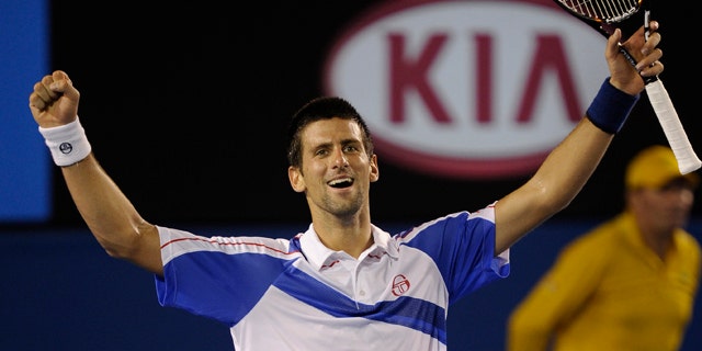 Jan. 30: Serbia's Novak Djokovic raises his arms in celebration after defeating Britain's Andy Murray in the men's singles final at the Australian Open tennis championships in Melbourne, Australia.