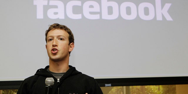 FILE - In this May, 26, 2010 file photo, Facebook CEO Mark Zuckerberg talks about the social network site's new privacy settings in Palo Alto, Calif.