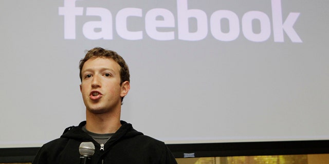 FILE - In this May, 26, 2010 file photo, Facebook CEO Mark Zuckerberg talks about the social network site's new privacy settings in Palo Alto, Calif.