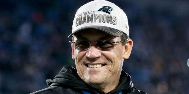 CHARLOTTE, NC - JANUARY 24: (L-R) Head coach Ron Rivera and owner Jerry Richardson of the Carolina Panthers smile after defeating the Arizona Cardinals with a score of 49 to 15 in the NFC Championship Game at Bank of America Stadium on January 24, 2016 in Charlotte, North Carolina. (Photo by Streeter Lecka/Getty Images)