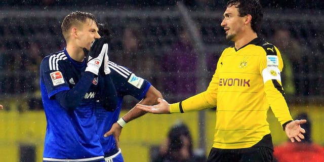 Football Soccer - Borussia Dortmund v FC Ingolstadt - German Bundesliga - Signal Iduna Park, Dortmund , 30/01/16FC Ingolstadt's Max Christiansen in action with Borussia Dortmund's Mats Hummels (R). REUTERS/Ina Fassbender DFL RULES TO LIMIT THE ONLINE USAGE DURING MATCH TIME TO 15 PICTURES PER GAME. IMAGE SEQUENCES TO SIMULATE VIDEO IS NOT ALLOWED AT ANY TIME. FOR FURTHER QUERIES PLEASE CONTACT DFL DIRECTLY AT + 49 69 650050 Picture Supplied by Action Images