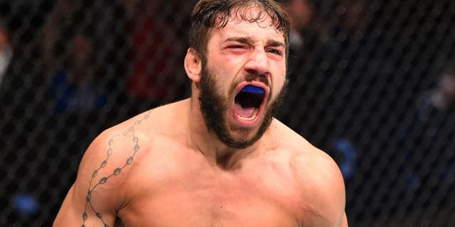 GLASGOW, SCOTLAND - JULY 18: Jimmie Rivera of the United States reacts after his TKO victory over Marcus Brimage of the United States in their bantamweight fight during the UFC Fight Night event inside the SSE Hydro on July 18, 2015 in Glasgow, Scotland. (Photo by Josh Hedges/Zuffa LLC/Zuffa LLC via Getty Images)