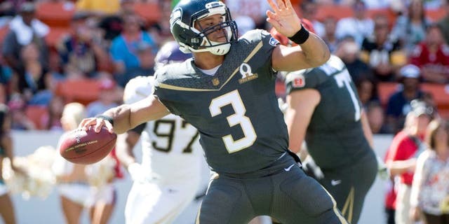 January 31, 2016; Honolulu, HI, USA; Team Irvin quarterback Russell Wilson of the Seattle Seahawks (3) passes the football against Team Rice during the first quarter of the 2016 Pro Bowl game at Aloha Stadium. Mandatory Credit: Kyle Terada-USA TODAY Sports