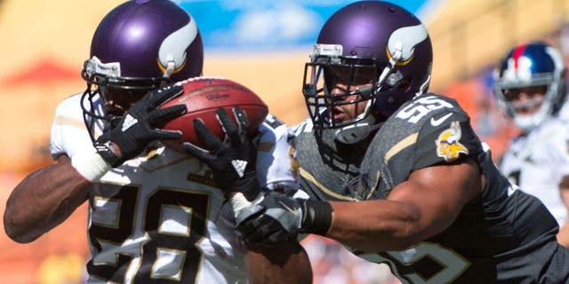 January 31, 2016; Honolulu, HI, USA; Team Rice running back Adrian Peterson of the Minnesota Vikings (28) is tackled by Team Irvin linebacker Anthony Barr of the Minnesota Vikings (55) during the first quarter of the 2016 Pro Bowl game at Aloha Stadium. Mandatory Credit: Kyle Terada-USA TODAY Sports