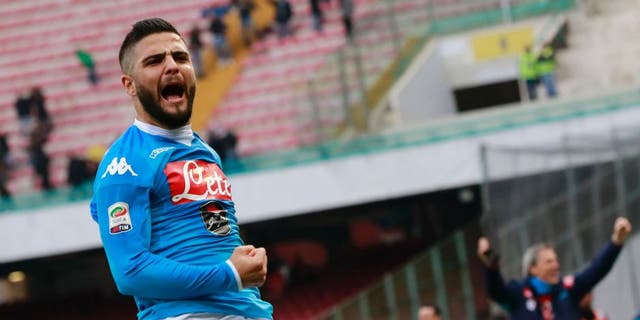 Napoli's Italian forward Lorenzo Insigne celebrates after scoring during the Italian Serie A football match SSC Napoli vs Empoli FC on January 31, 2016 at the San Paolo stadium in Naples. / AFP / CARLO HERMANN (Photo credit should read CARLO HERMANN/AFP/Getty Images)