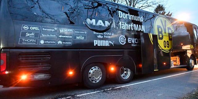 A window of Dortmund's team bus is damaged after an explosion before the Champions League quarterfinal soccer match between Borussia Dortmund and AS Monaco in Dortmund, western Germany, Tuesday, April 11, 2017. (AP Photo/Martin Meissner)