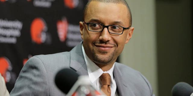FILE - In this Jan. 13, 2016, file photo, Cleveland Browns Executive Vice President of Football Operations, Sashi Brown, addresses the media during a news conference in Berea, Ohio. The Browns are inclined to keep the No. 1 overall pick in next weeks NFL draft despite getting offers for it. Sashi Brown said Wednesday, April 19, 2017, that the Browns feel really good about drafting No. 1." (AP Photo/Tony Dejak, File)