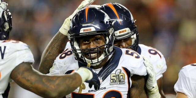 FILE - In this Feb. 7, 2016, file photo, Denver Broncos' Von Miller (58) celebrates with teammates in the fourth quarter of the NFL Super Bowl 50 football game in Santa Clara, Calif. Von Miller has his Super Bowl 50 helmet back. The FBI retrieved his helmet from Mexican authorities who also recovered Tom Brady's two Super Bowl jerseys in Mexico City last month. Special agents Brian Schmitt, Melissa Tallman and Clint Judd delivered the helmet to Miller at the UC Heath Center on Wednesday, April 19, 2017. (AP Photo/Gregory Payan, File)