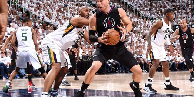 SALT LAKE CITY, UT - APRIL 21: Blake Griffin #32 of the Los Angeles Clippers handles the ball during the game against the Utah Jazz during the Western Conference Quarter-finals of the 2017 NBA Playoffs on April 21, 2017 at Vivint Smart Home Arena in Salt Lake City, Utah. NOTE TO USER: User expressly acknowledges and agrees that, by downloading and or using this Photograph, User is consenting to the terms and conditions of the Getty Images License Agreement. Mandatory Copyright Notice: Copyright 2017 NBAE (Photo by Andrew D. Bernstein/NBAE via Getty Images)