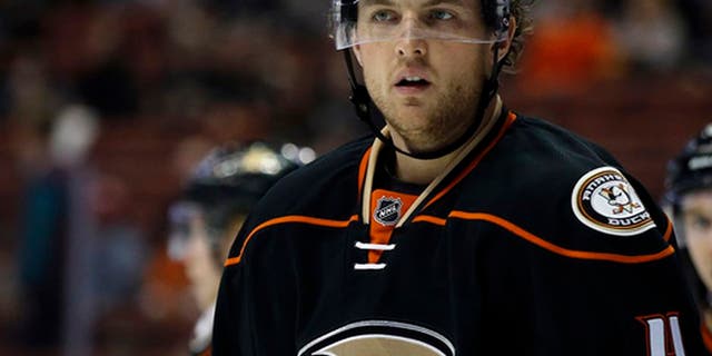This Dec. 11, 2016 photo shows Anaheim Ducks defenseman Cam Fowler (4) looking over during a time out in action during the first period of an NHL hockey game against the Ottawa Senators in Anaheim, Calif. Fowler has returned to practice with the Ducks nearly three weeks after a knee injury, and the All-Star defenseman could be on target to return to their lineup for their second-round playoff opener against Edmonton. (AP Photo/Alex Gallardo)
