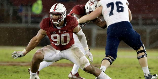 FILE - In this Nov. 26, 2016, file photo, Stanford defensive end Solomon Thomas (90) during an NCAA college football game against Rice, in Stanford, Calif. Thomas is a possible first round pick in the NFL Draft in Philadelphia on Thursday, April 27, 2017.(AP Photo/Marcio Jose Sanchez, FIle)