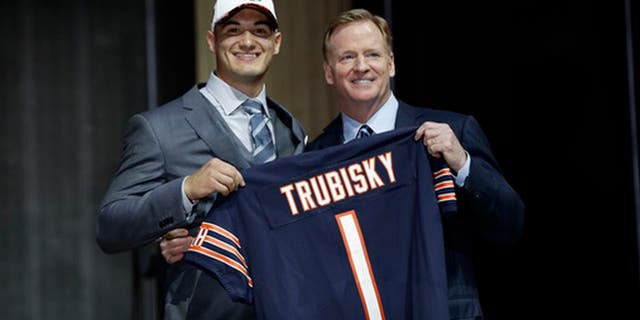 North Carolina's Mitch Trubisky, left, poses with NFL commissioner Roger Goodell after being selected by the Chicago Bears during the first round of the 2017 NFL football draft, Thursday, April 27, 2017, in Philadelphia. (AP Photo/Matt Rourke)