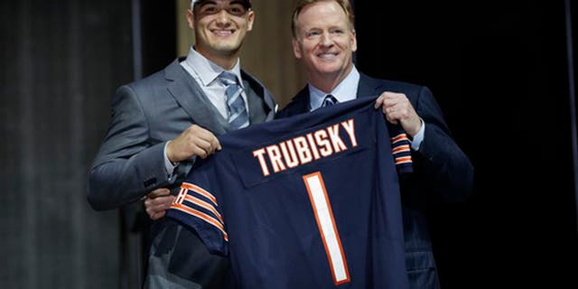 North Carolina's Mitch Trubisky, left, poses with NFL commissioner Roger Goodell after being selected by the Chicago Bears during the first round of the 2017 NFL football draft, Thursday, April 27, 2017, in Philadelphia. (AP Photo/Matt Rourke)