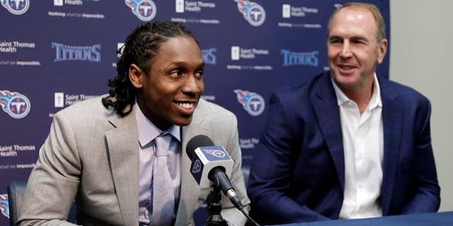 Southern California defensive back Adoree' Jackson, left, answers questions as he sits with Tennessee Titans coach Mike Mularkey during a news conference Friday, April 28, 2017, in Nashville, Tenn. Jackson is the NFL football team's second pick in the draft. (AP Photo/Mark Humphrey)