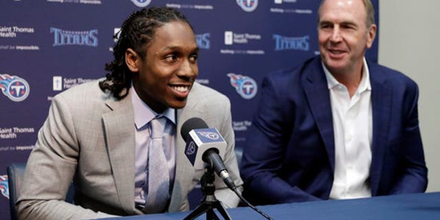 Southern California defensive back Adoree' Jackson, left, answers questions as he sits with Tennessee Titans coach Mike Mularkey during a news conference Friday, April 28, 2017, in Nashville, Tenn. Jackson is the NFL football team's second pick in the draft. (AP Photo/Mark Humphrey)
