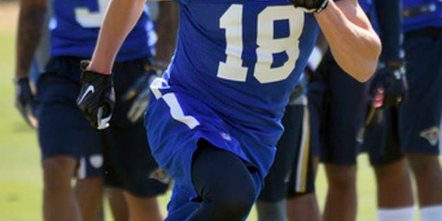 Los Angeles Rams wide receiver Cooper Kupp (18) runs a drill during an NFL football rookie minicamp at the team's practice facility in Thousand Oaks, Calif., Friday, May 12, 2017. (AP Photo/Michael Owen Baker)