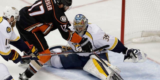 Anaheim Ducks center Ryan Kesler misses a shot against Nashville Predators goalie Pekka Rinne during the first period of Game 5 in the NHL hockey Stanley Cup Western Conference finals in Anaheim, Calif., Saturday, May 20, 2017. (AP Photo/Chris Carlson)