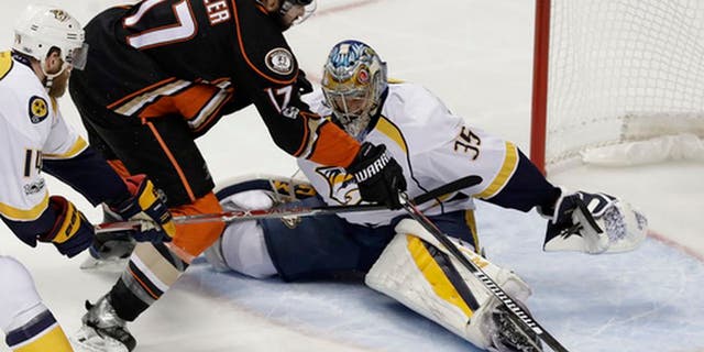 Anaheim Ducks center Ryan Kesler misses a shot against Nashville Predators goalie Pekka Rinne during the first period of Game 5 in the NHL hockey Stanley Cup Western Conference finals in Anaheim, Calif., Saturday, May 20, 2017. (AP Photo/Chris Carlson)