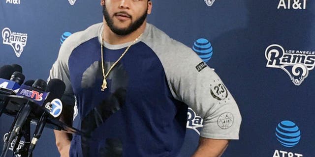Los Angeles Rams defensive lineman Aaron Donald speaks with reporters after the first official day of the team's offseason football training program, Monday, April 10, 2017, in Thousand Oaks, Calif. (AP Photo/Greg Beacham)