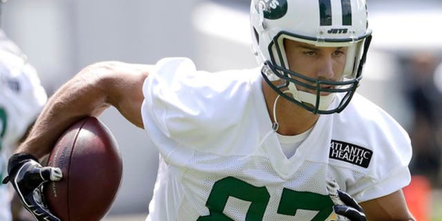 FILE - In this Thursday, July 28, 2016 file photo, New York Jets wide receiver Eric Decker runs a drill during NFL football training camp in Florham Park, N.J. The New York Jets are planning to trade or cut wide receiver Eric Decker, the latest move in what has been an offseason purge of veterans with big contracts. General manager Mike Maccagnan says Tuesday night, June 6, 2017 that if the Jets cant deal Decker, they will move forward without him. (AP Photo/Julio Cortez, File)