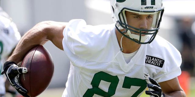 FILE - In this Thursday, July 28, 2016 file photo, New York Jets wide receiver Eric Decker runs a drill during NFL football training camp in Florham Park, N.J. The New York Jets are planning to trade or cut wide receiver Eric Decker, the latest move in what has been an offseason purge of veterans with big contracts. General manager Mike Maccagnan says Tuesday night, June 6, 2017 that if the Jets cant deal Decker, they will move forward without him. (AP Photo/Julio Cortez, File)