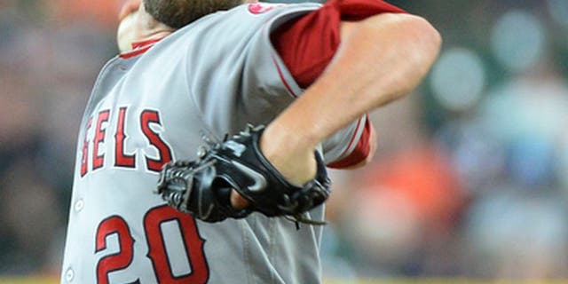 FILE - In this Thursday, April 20, 2017 file photo, Los Angeles Angels reliever Bud Norris pitches against the Houston Astros in a baseball game in Houston. Angels closer Bud Norris has been placed on the 10-day disabled list because of right knee inflammation, Tuesday, June 20, 2017. (AP Photo/George Bridges, File)