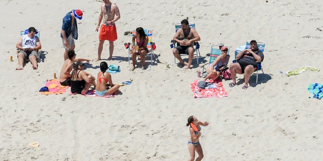 A wider shot of Christie with family and friends.