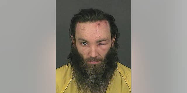This booking photo released on Feb. 2, 2017 by the Denver Police Department shows homicide suspect Joshua A. Cummings in Denver. Cummings was arrested shortly after the point-blank shooting death of a transit guard in downtown Denver on Tuesday, Jan. 31, 2017. (Denver Police Department via AP)