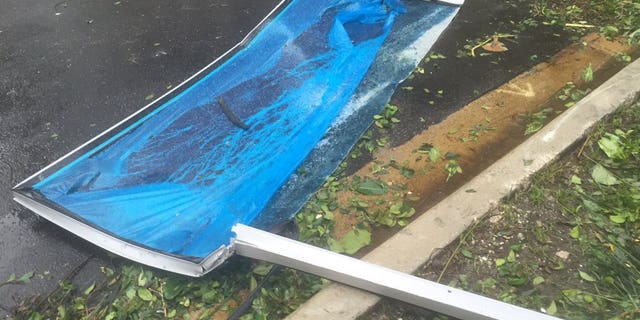 Glass panels fell from a high-rise building in Miami on Sunday after Hurricane Irma pushed its way through the city.