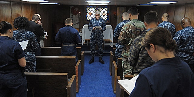 Jan. 30: Capt. Stephen Pike, chaplain of Commander, U.S. Naval Forces Europe-Africa/U.S. 6th Fleet, leads Sailors and embarked staff in prayer aboard the amphibious command ship USS Mount Whitney.