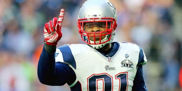 Jamie Collins #91 of the New England Patriots reacts after stopping Marshawn Lynch #24 of the Seattle Seahawks in the first quarter during Super Bowl XLIX at University of Phoenix Stadium on February 1, 2015 in Glendale, Arizona. (Photo by Elsa/Getty Images)