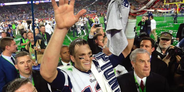 Tom Brady #12 of the New England Patriots celebrates after defeating the Seattle Seahawks during Super Bowl XLIX at University of Phoenix Stadium on February 1, 2015 in Glendale, Arizona. The Patriots defeated the Seahawks 28-24. (Photo by Rob Carr/Getty Images)