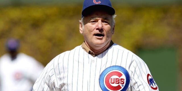 CHICAGO, IL - APRIL 05: Actor Bill Murray runs the bases before throwing out a ceremonial first pitch before the Chicago Cubs take on the Washington Nationals during the opening day game at Wrigley Field on April 5, 2012 in Chicago, Illinois. The Nationals defeated the Cubs 2-1. (Photo by Jonathan Daniel/Getty Images) *** Local Caption *** Bill Murray