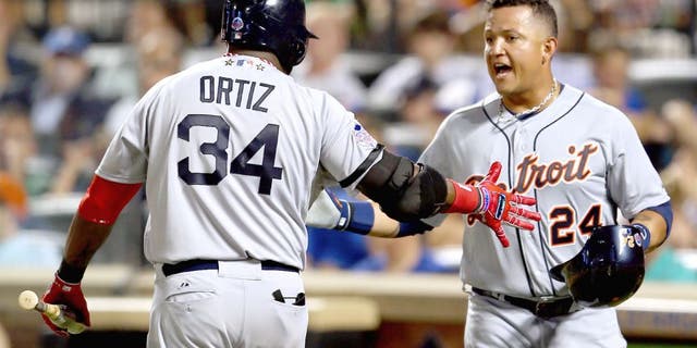 NEW YORK, NY - JULY 16: American League All-Star David Ortiz #34 of the Boston Red Sox greets American League All-Star Miguel Cabrera #24 of the Detroit Tigers after Cabrera scored in the fourth inning during the 84th MLB All-Star Game on July 16, 2013 at Citi Field in the Flushing neighborhood of the Queens borough of New York City. (Photo by Mike Ehrmann/Getty Images)