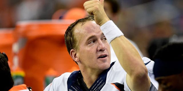 DETROIT, MI - SEPTEMBER 27: Peyton Manning (18) of the Denver Broncos smiles on the bench as the clock winds down late in the fourth against the Detroit Lions during the second half of the Broncos' 24-12 win at Ford Field. The Detroit Lions hosted the Denver Broncos in NFL week 3 action on Sunday, September 27, 2015. (Photo by AAron Ontiveroz/The Denver Post via Getty Images)